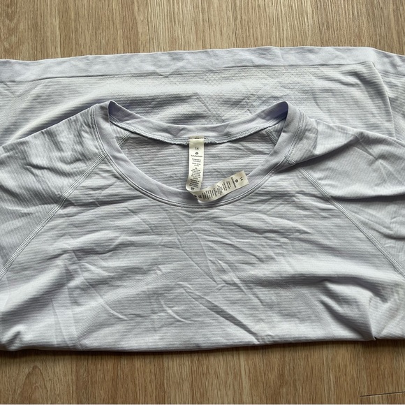lululemon athletica Tops - Swiftly Tech Short-Sleeve Shirt 2.0 race length 
 Lululemon top - size 14